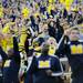 Michigan fans celebrate after Brendan Gibbons kicked a field goal to tie the game late in the fourth quarter against Northwestern at Michigan Stadium on Saturday. Melanie Maxwell I AnnArbor.com